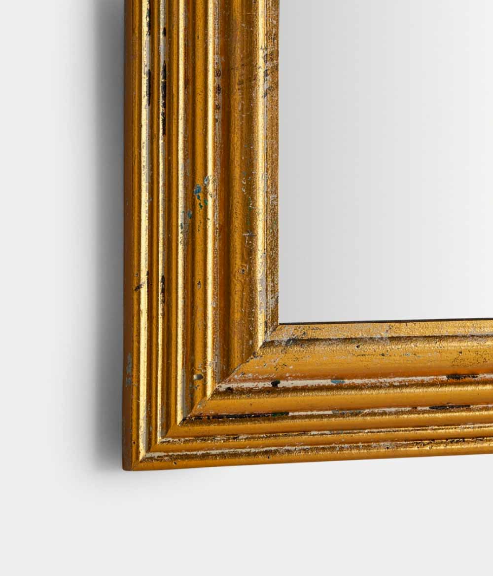 Espejo dorado Alma - Un gran espejo rectangular inspirado